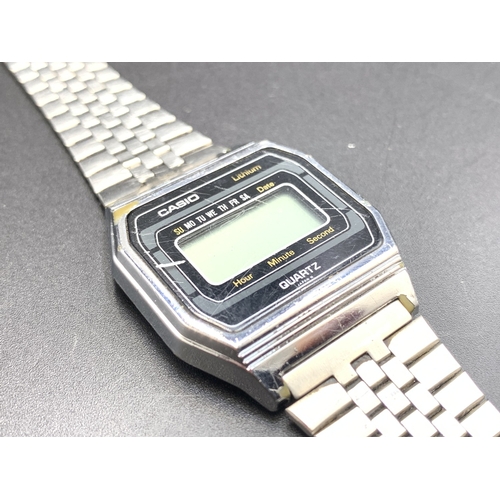 Two men's quartz wristwatches, one Casio digital and one Skagen of Denmark