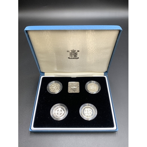 2253B - A boxed Royal Mint 1994-1997 United Kingdom .925 silver proof piedfort one pound coin collection wit... 