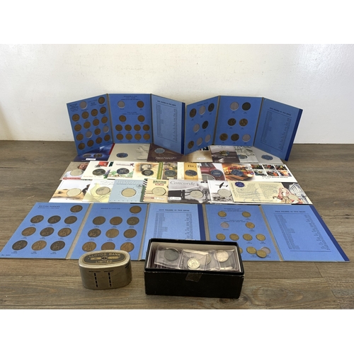 A collection of coin covers and world coins with 50% silver British ...