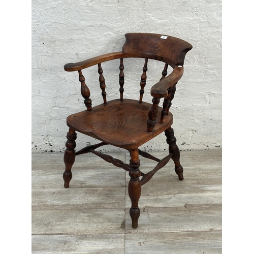 140 - A Victorian elm and beech smoker's bow chair - approx. 81cm high x 66cm wide x 48cm deep