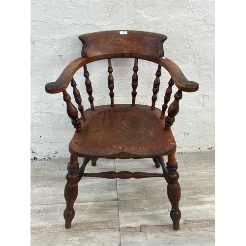 140 - A Victorian elm and beech smoker's bow chair - approx. 81cm high x 66cm wide x 48cm deep