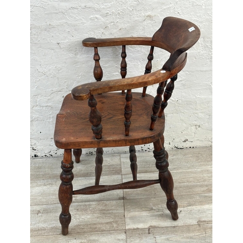 140 - A Victorian elm and beech smoker's bow chair - approx. 81cm high x 66cm wide x 48cm deep