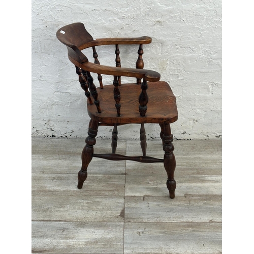 140 - A Victorian elm and beech smoker's bow chair - approx. 81cm high x 66cm wide x 48cm deep