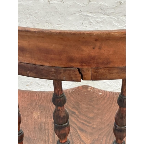 140 - A Victorian elm and beech smoker's bow chair - approx. 81cm high x 66cm wide x 48cm deep