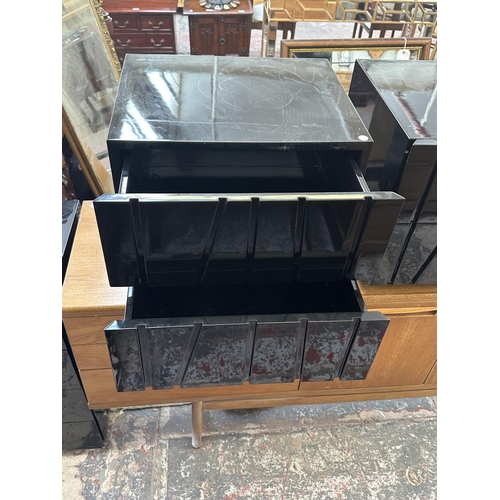 142 - A pair of modern black lacquered bedside chests of drawers - approx. 45cm high x 50cm wide x 43cm de... 