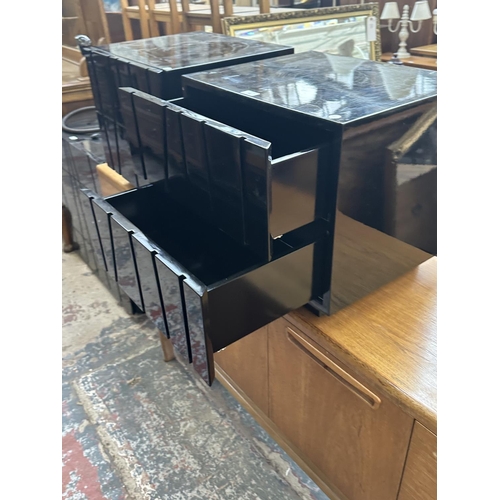 142 - A pair of modern black lacquered bedside chests of drawers - approx. 45cm high x 50cm wide x 43cm de... 