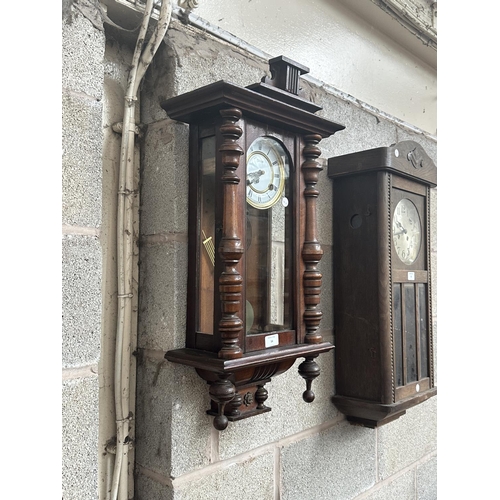 A Highlands mahogany cased chiming wall clock with pendulum and key ...
