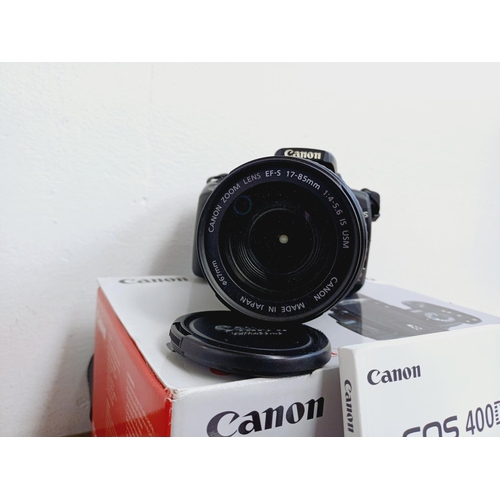 1 - A boxed Canon EOS 400D 10.1mp DSLR camera fitted with Ultrasonic EF-S 1:4-5.6 IS USM zoom lens, batt... 