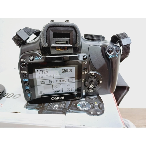 1 - A boxed Canon EOS 400D 10.1mp DSLR camera fitted with Ultrasonic EF-S 1:4-5.6 IS USM zoom lens, batt... 