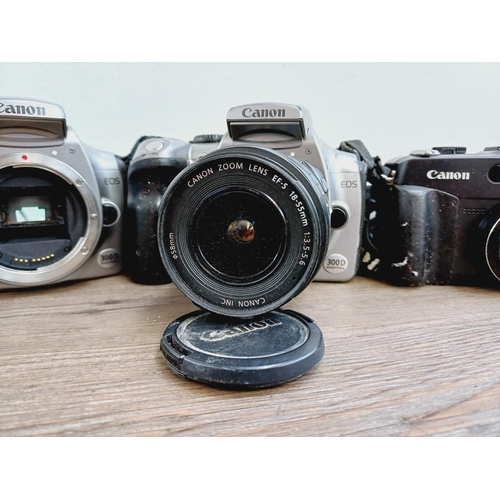 2 - Four Canon digital cameras, one EOS 300D 6mp DSLR fitted with EF-S 1:3.5-5.6 zoom lens, one EOS 300D... 