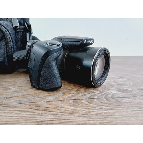 3 - Two Canon PowerShot CCD sensor compact digital cameras, one cased SX410 IS 20mp and one SX400 IS 16m... 