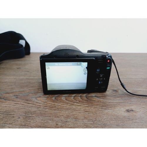 3 - Two Canon PowerShot CCD sensor compact digital cameras, one cased SX410 IS 20mp and one SX400 IS 16m... 