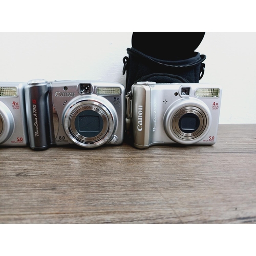 5 - Four Canon PowerShot CCD sensor compact digital cameras, one cased A710 IS 8mp, two A530 5mp and one... 