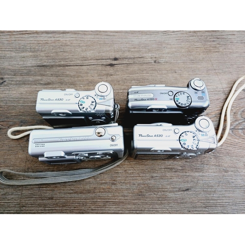 5 - Four Canon PowerShot CCD sensor compact digital cameras, one cased A710 IS 8mp, two A530 5mp and one... 