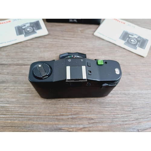 26 - A cased Minox 35 PL ultra-compact 35mm camera with instruction manual