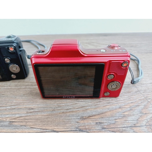 18 - Two Olympus SZ-15 16mp CCD sensor compact digital cameras