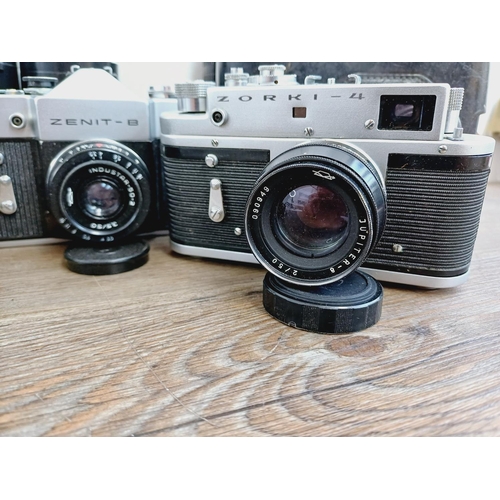 44 - Four KMZ 35mm cameras, one cased Zorki-4 rangefinder fitted with Jupiter-8 2/50 lens, one cased Zeni... 