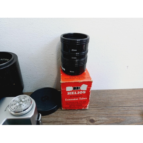 44 - Four KMZ 35mm cameras, one cased Zorki-4 rangefinder fitted with Jupiter-8 2/50 lens, one cased Zeni... 