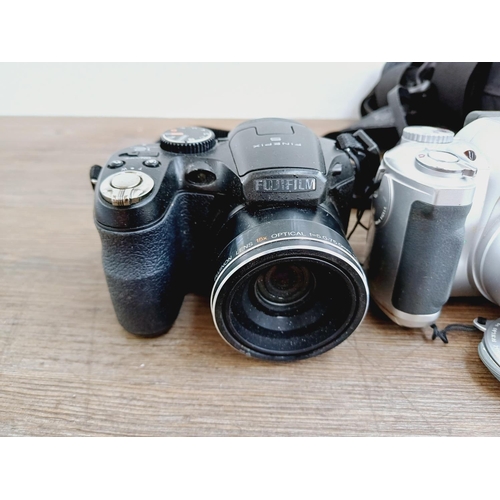 53 - Five Fujifilm FinePix digital bridge cameras to include HS25EXR 16mp CMOS sensor, S1730 12mp, S1600 ... 