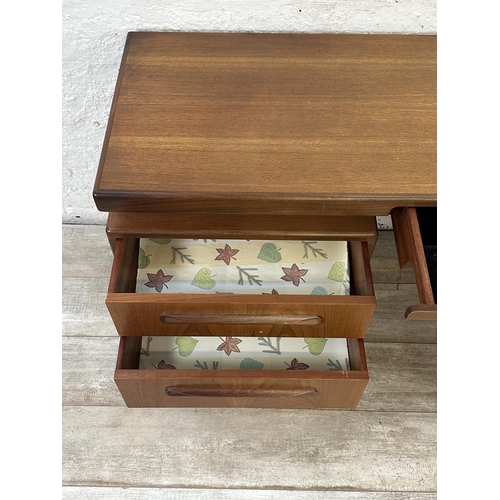 1152 - A mid 20th century G Plan Fresco teak floating top dressing table - approx. 70cm high x 152cm wide x... 