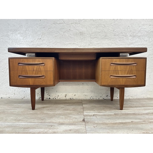 1152 - A mid 20th century G Plan Fresco teak floating top dressing table - approx. 70cm high x 152cm wide x... 
