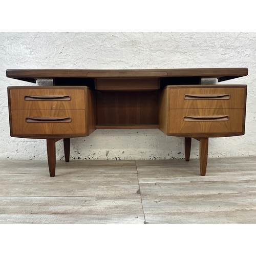 1152 - A mid 20th century G Plan Fresco teak floating top dressing table - approx. 70cm high x 152cm wide x... 
