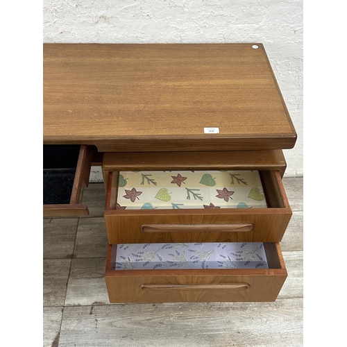 1152 - A mid 20th century G Plan Fresco teak floating top dressing table - approx. 70cm high x 152cm wide x... 