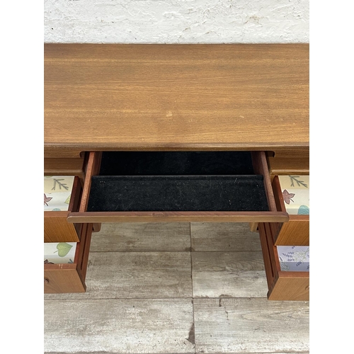 1152 - A mid 20th century G Plan Fresco teak floating top dressing table - approx. 70cm high x 152cm wide x... 