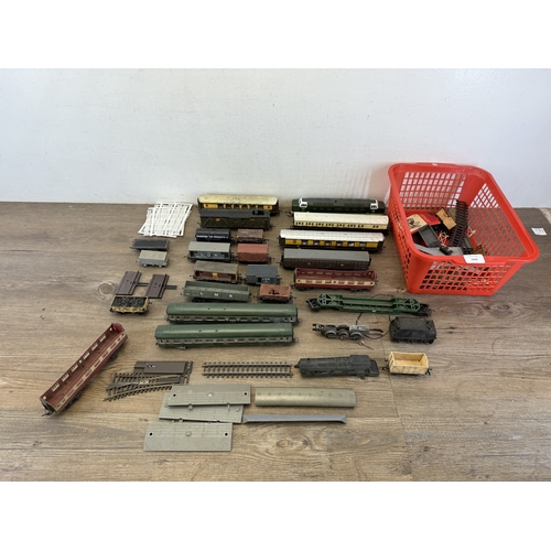 A collection of railway model vehicles to include Tri-ang D-459 garage ...