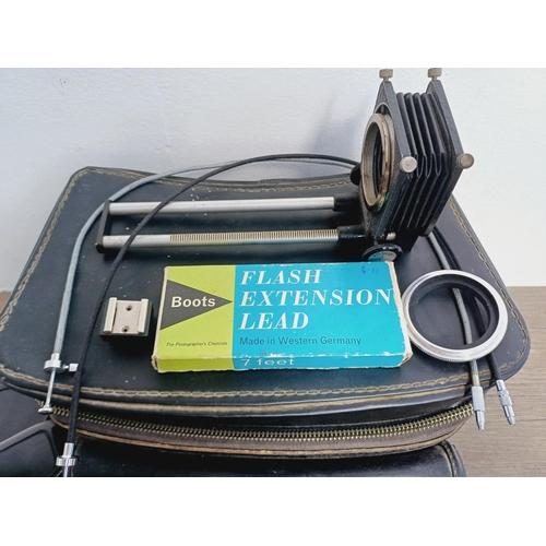 37 - A camera bag containing two Pentacon Praktica M42-mount 35mm SLR cameras, one L fitted with Meyer-Op... 