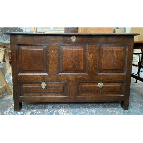 109 - A Georgian oak panelled coffer - approx. 80cm high x 132cm wide x 57cm deep