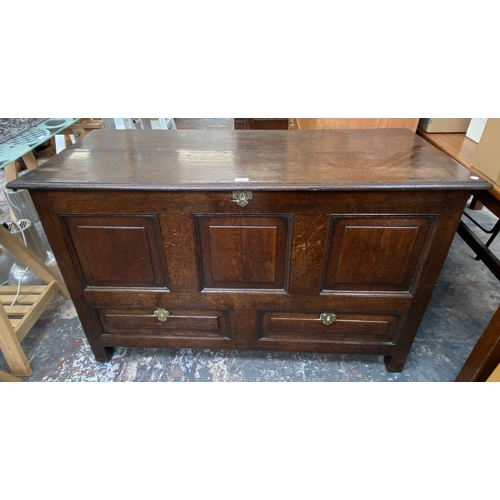 109 - A Georgian oak panelled coffer - approx. 80cm high x 132cm wide x 57cm deep