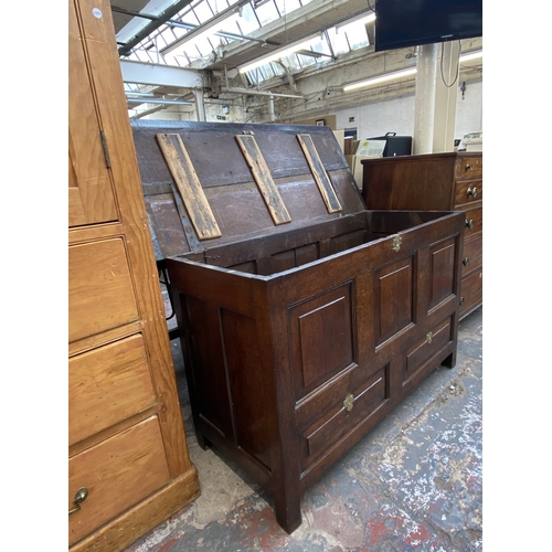 109 - A Georgian oak panelled coffer - approx. 80cm high x 132cm wide x 57cm deep