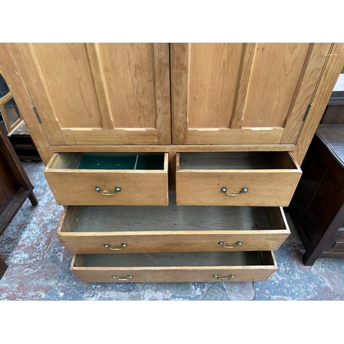 110 - A Victorian pine housekeeper's cupboard - approx. 226cm high x 132cm wide x 41cm deep