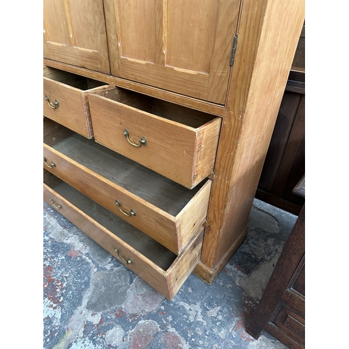 110 - A Victorian pine housekeeper's cupboard - approx. 226cm high x 132cm wide x 41cm deep