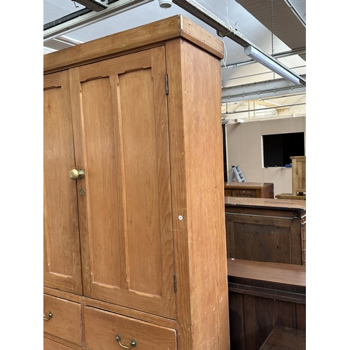 110 - A Victorian pine housekeeper's cupboard - approx. 226cm high x 132cm wide x 41cm deep