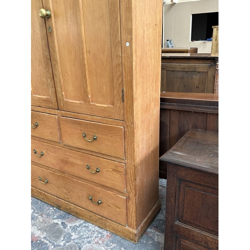 110 - A Victorian pine housekeeper's cupboard - approx. 226cm high x 132cm wide x 41cm deep