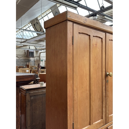 110 - A Victorian pine housekeeper's cupboard - approx. 226cm high x 132cm wide x 41cm deep