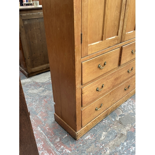 110 - A Victorian pine housekeeper's cupboard - approx. 226cm high x 132cm wide x 41cm deep