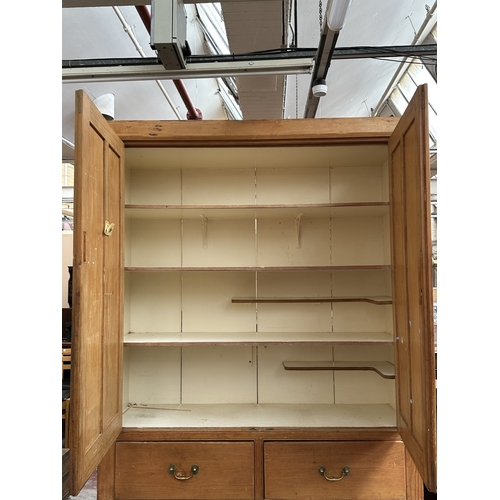 110 - A Victorian pine housekeeper's cupboard - approx. 226cm high x 132cm wide x 41cm deep