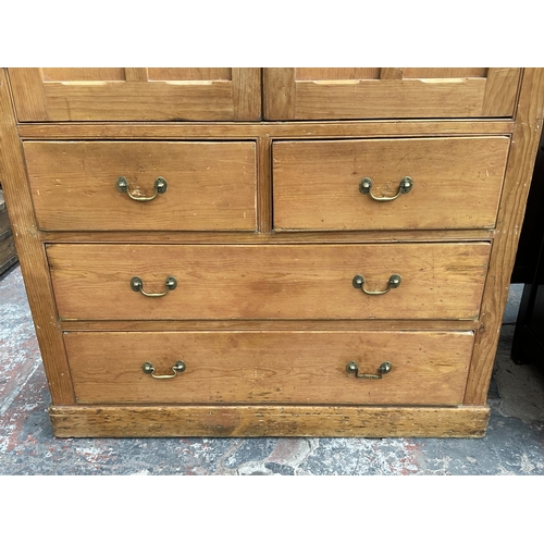 110 - A Victorian pine housekeeper's cupboard - approx. 226cm high x 132cm wide x 41cm deep