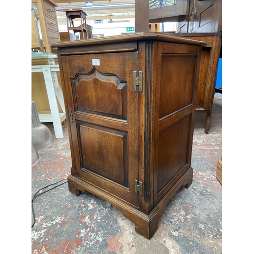 111 - A Titchmarsh & Goodwin style oak stereo cabinet containing Sony five piece stereo system and Matsui ... 