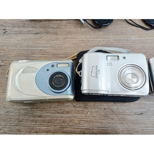 132 - Ten Nikon Coolpix compact digital cameras to include S570 12mp, two P50 8.1mp, L6 6mp, two 4300 4mp ... 
