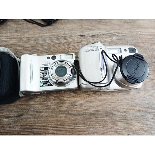 132 - Ten Nikon Coolpix compact digital cameras to include S570 12mp, two P50 8.1mp, L6 6mp, two 4300 4mp ... 