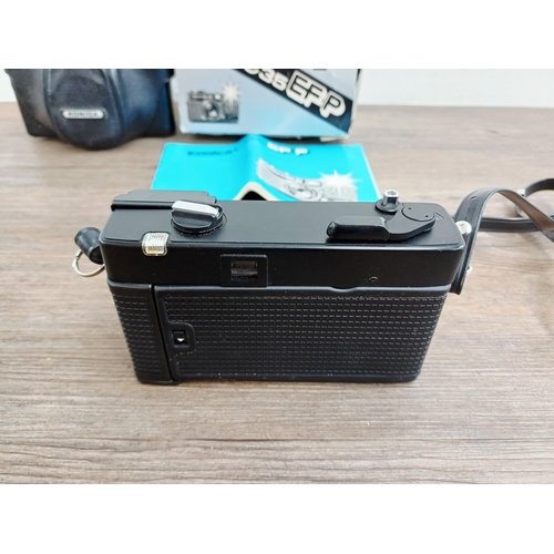 168 - A boxed and cased Konica C35 EFP compact 35mm viewfinder camera with instruction manual