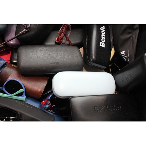 A large quantity of branded and prescription glasses to include ...