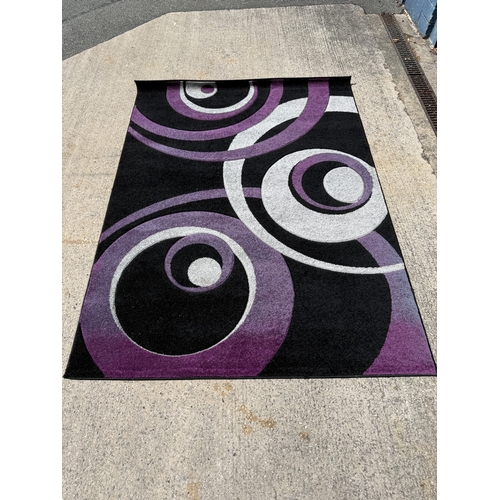 A Home Trends Vive Collection purple, silver and black rug - approx ...