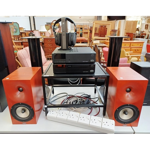 Four items of hi-fi, one Linn Majik-I amplifier, one Linn Karik CD player with The Sound Organisation stand, one pair of Sennheiser TR175 wireless headphones and one pair of Amphion Loudspeakers Ltd. Argon 2 8Ω speakers with heavy duty stands together with Audioquest cables, Aphel Limited six-way power supply etc.
