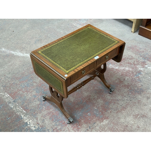 1032 - A Regency style mahogany and green leather drop leaf lyre end side table - approx. 56cm high x 105cm... 