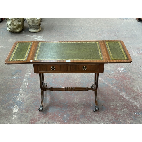 1032 - A Regency style mahogany and green leather drop leaf lyre end side table - approx. 56cm high x 105cm... 